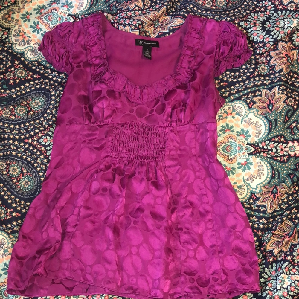 Purple shirt.